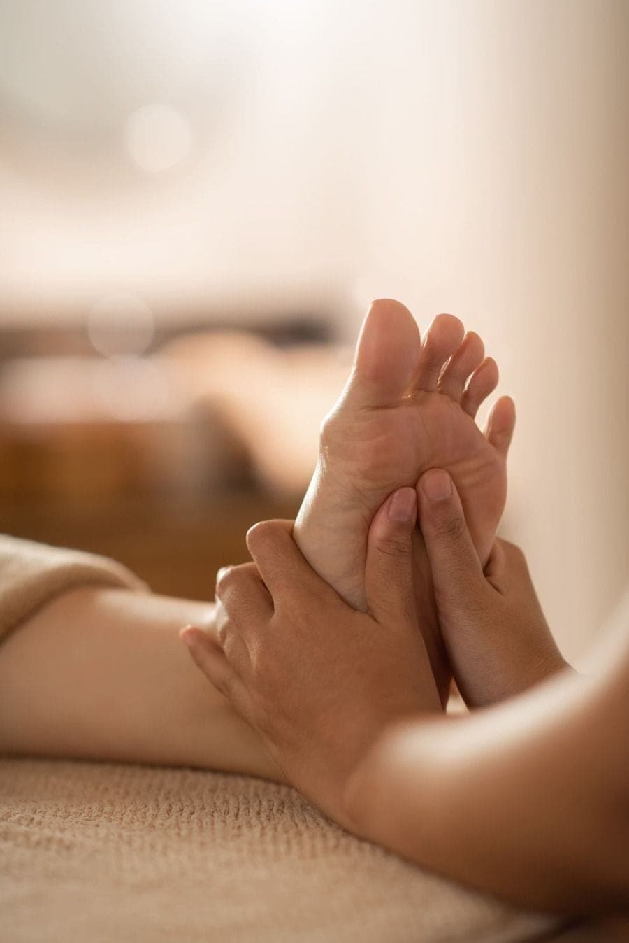 Thai foot massage with acupressure on the soles of the feet