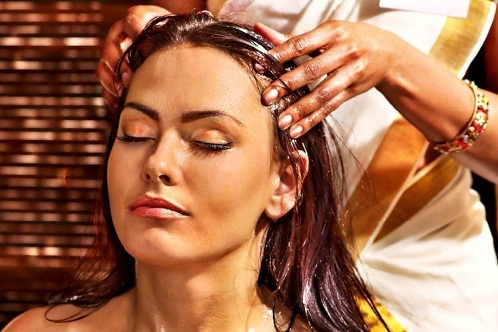 Deep tissue massage using firm pressure on the upper back